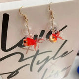 Boucles d’oreilles Poisson Rouge en Bulle Cristalline