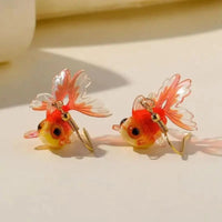 Boucles d’oreilles Poisson Rouge Transparent en Résine