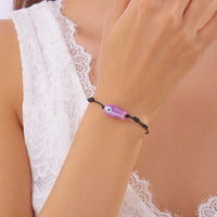 Bracelet Poisson Violet Ajustable, mettant en évidence la couleur douce du poisson et le style minimaliste du cordon