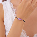 Bracelet Poisson Violet Ajustable, mettant en évidence la couleur douce du poisson et le style minimaliste du cordon