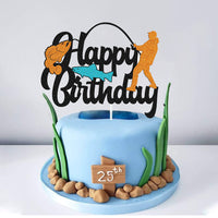 Cake Topper Décoration Anniversaire Pêcheur affichant « Happy Birthday », avec un pêcheur et des poissons, idéal pour décorer un gâteau sur le thème de la pêche.