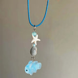 Collier Poisson Bleu Pastel avec Étoile de Mer