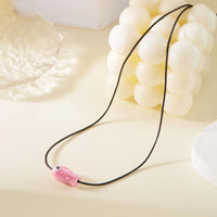 Collier Poisson Rose sur Cordon Ajustable