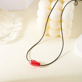 Collier Poisson Rouge sur Cordon Ajustable