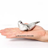 figurine phoque blanc