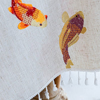 nappe poisson orange brodée franges détail frange