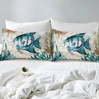 Housse de couette Poisson Ange marin, présentant de magnifiques poissons turquoise sur fond de carte marine et ornée d’éléments de la mer.